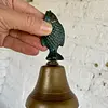 Campana De Mano Con Un Pez Como Mango