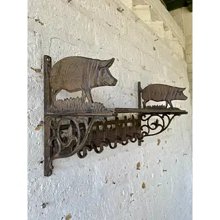 Repisa Perchero En Hierro Fundido Con Figura De Cerdos